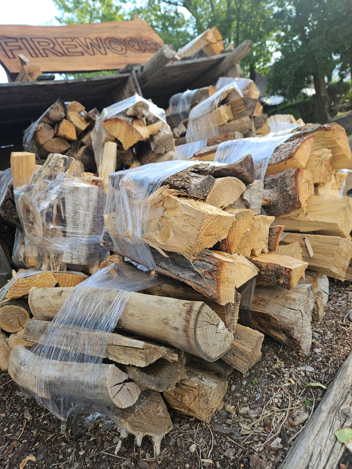 Firewood bundles stacked outdoors